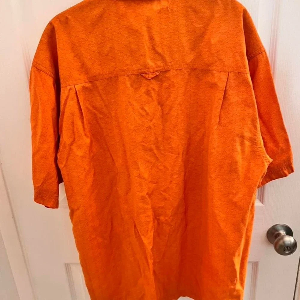 The North Face Orange button-up shirt with a boho vibe‎